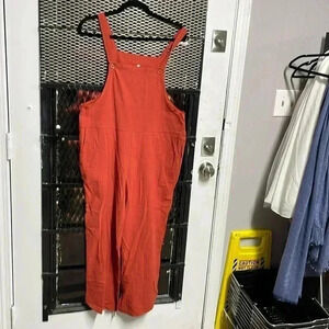 Woman jump suit nice bronze orange color size small